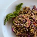 This Spicy Peanut Quinoa Salad is vegan and gluten free. Awesome to make ahead and bring to a party.