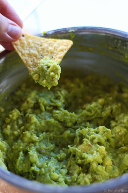 This super easy guacamole only has 4 ingredients and is sooo easy to make. Also, totally addictive!