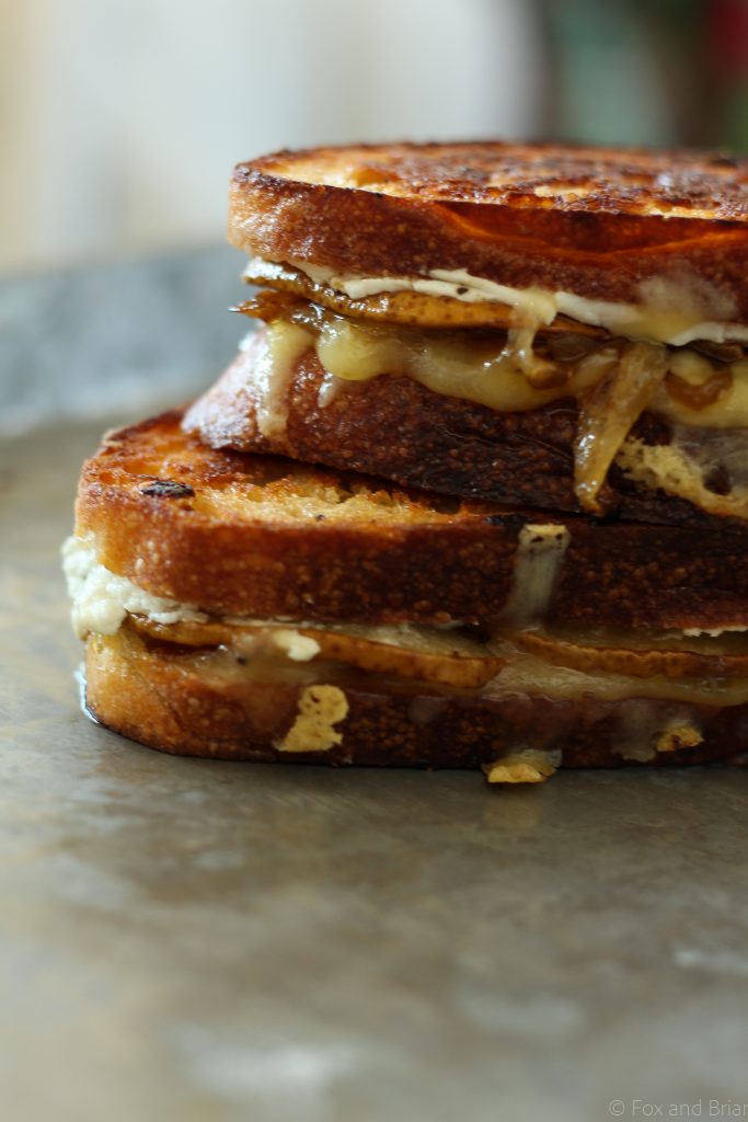 This grown up grilled cheese is stuffed with honey roasted pears, caramelized onions, creamy goat cheese and sharp cheddar.