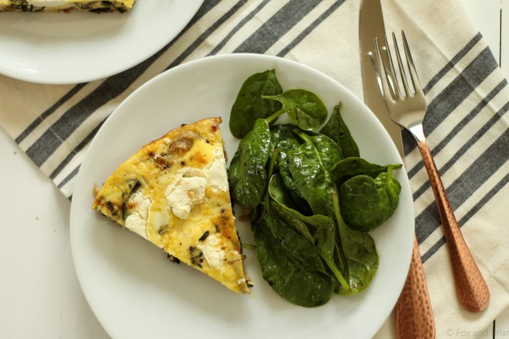 This savory frittata gets lots of flavor from caramelized onions, goat cheese and crispy kale! Vegetarian and gluten free!