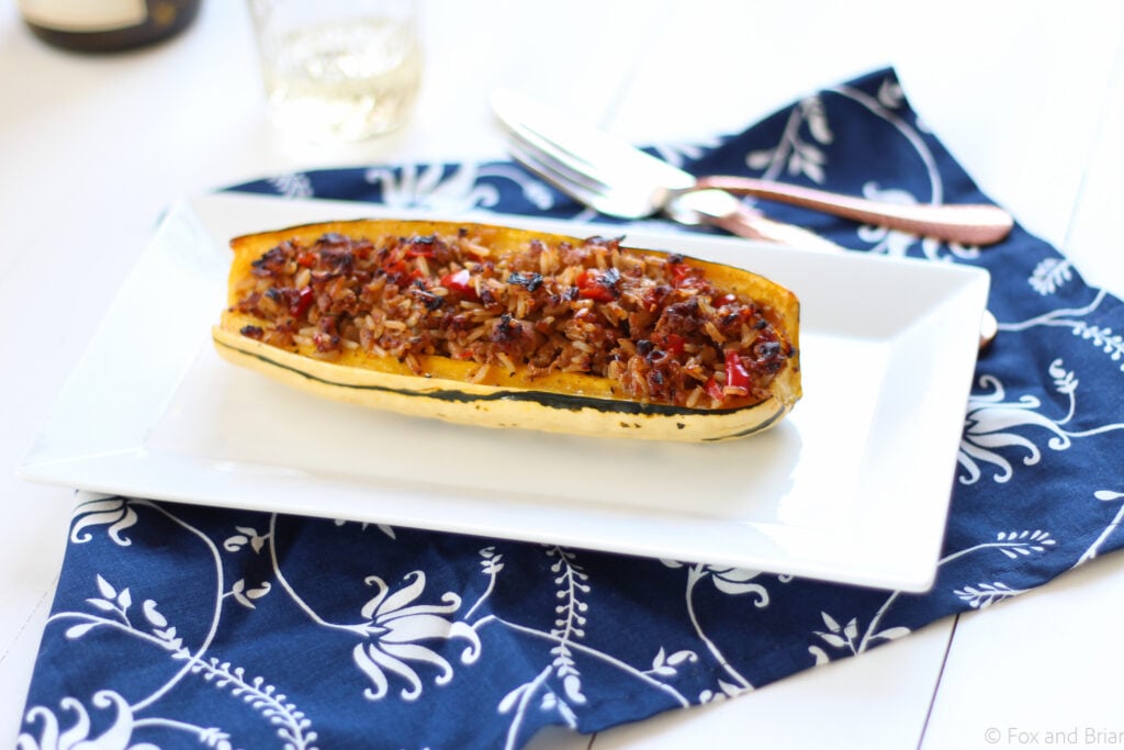 This Stuffed Delicata Squash Recipe uses chicken sausage, brown rice and white wine and is so flavorful