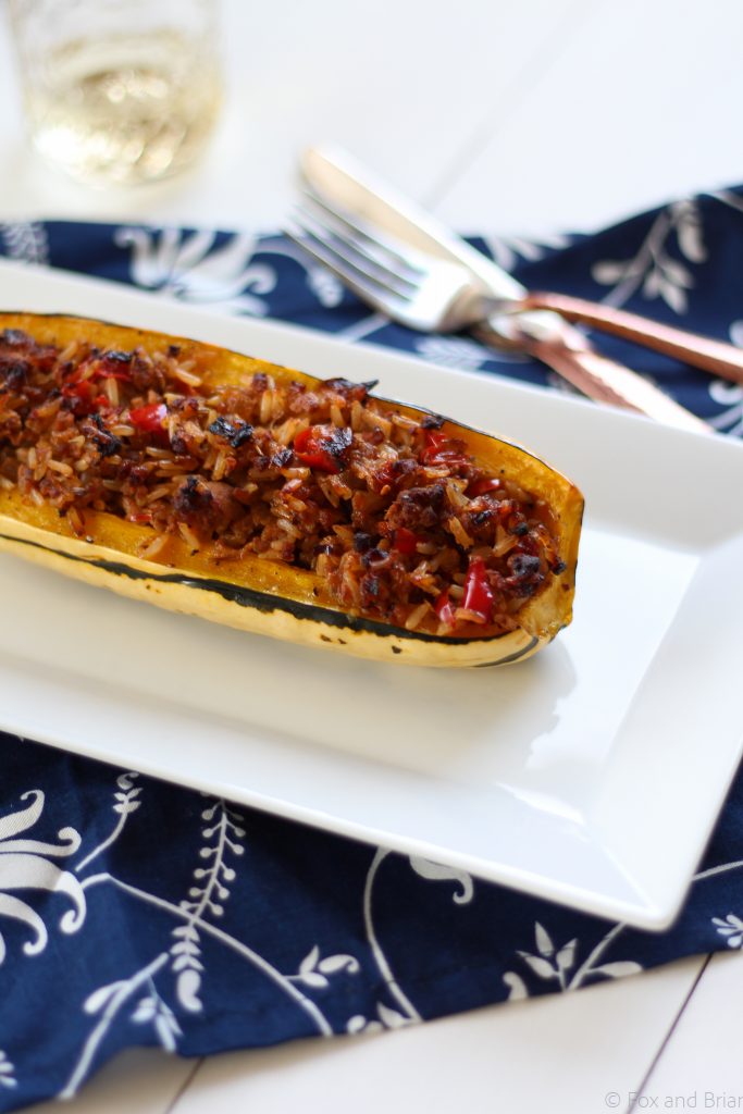 This Stuffed Delicata Squash Recipe uses chicken sausage, brown rice and white wine and is so flavorful