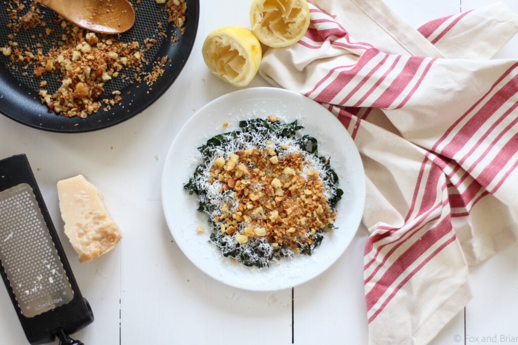 This simple kale salad has 5 ingredients, but it is THE BEST! Based on a salad I had at the fabulous Ava Gene's restaurant in Portland, OR. The kale is massaged, so it is tender, the cheese gives tons of flavor, and homemade breadcrumbs give the perfect crunch.