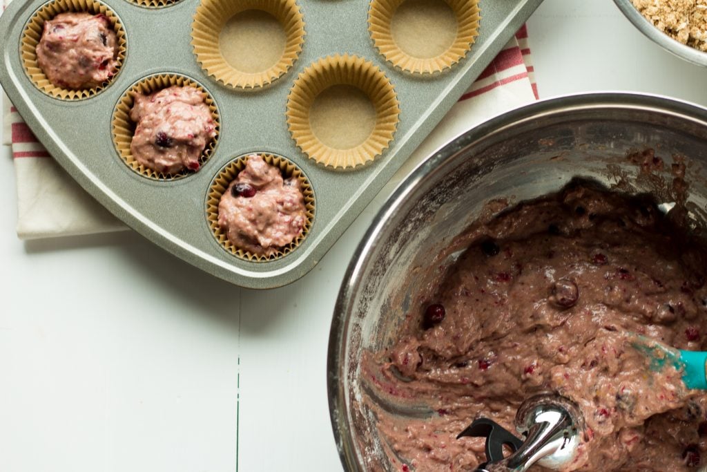 These muffins are super moist and made with cranberry sauce and fresh cranberries with hints or orange and brown sugar.