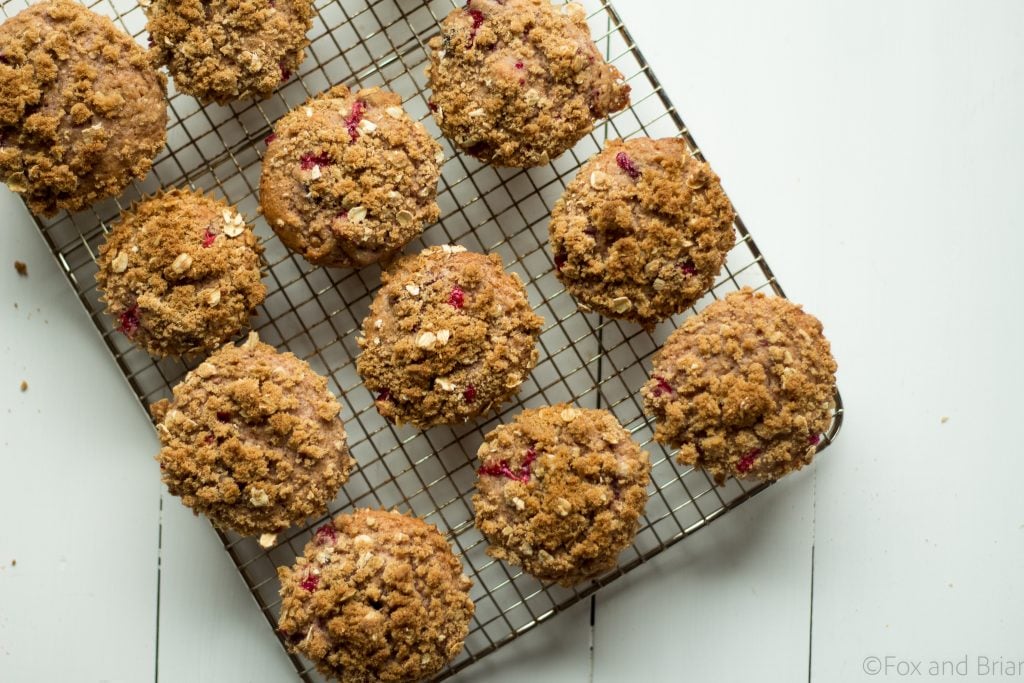 These muffins are super moist and made with cranberry sauce and fresh cranberries with hints or orange and brown sugar.