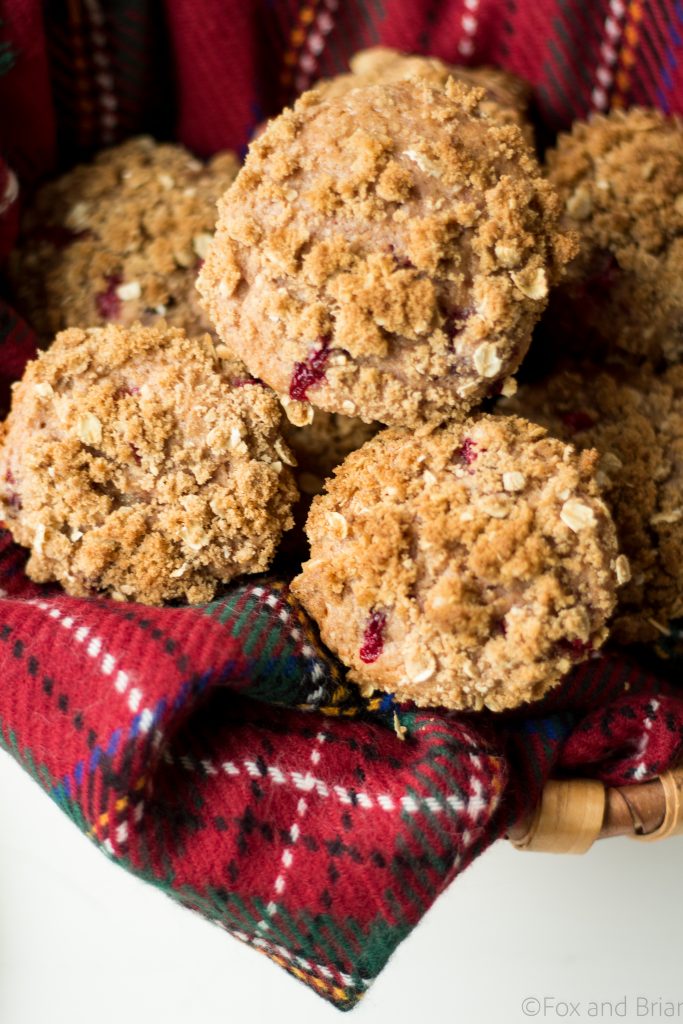 Looking for a way to use up your leftover cranberry sauce? These Leftover Cranberry Sauce Muffins are just the thing! Hints of orange zest, tart cranberries and a brown sugar crumble topping will make these the perfect breakfast the day after Thanksgiving! |Cranberry orange muffins | Leftover cranberry sauce recipes | strudel topping for muffins | thanksgiving leftover recipes