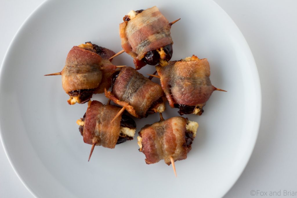 Goat Cheese Stuffed Bacon Wrapped Dates - these are so easy, only take 3 ingredients and are wildly addictive! They will dissapear before you know it.