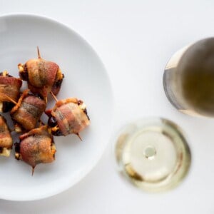 Goat Cheese Stuffed Bacon Wrapped Dates - these are so easy, only take 3 ingredients and are wildly addictive! They will dissapear before you know it.