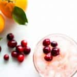 This non alcoholic mocktail is a fun and festive drink with homemade cranberry orange syrup