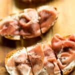 This Fig, Goat Cheese and Prosciutto Bruschetta is a delicious but quick and easy appetizer. The sweetness of the figs, tangy goat cheese and salty prosciutto are a perfect match!