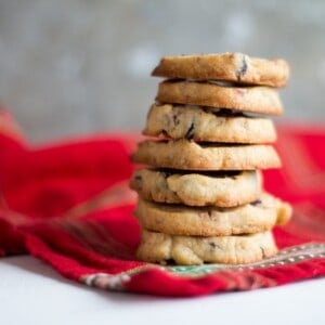 Cranberry Orange and Pecan Shortbread cookies. These easy, slice and bake cookies are flavored with orange zest, vanilla, cranberries and pecans. They are the perfect holiday cookies to give away or keep for yourself!