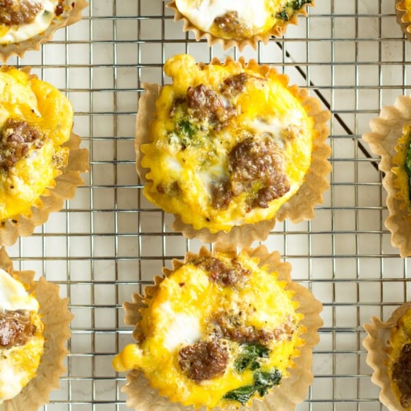 These sausage and egg make ahead muffins are a low carb, grain free, high protein breakfast that you can make ahead and store in the fridge., On busy mornings, just heat them up and have a quick healthy breakfast.