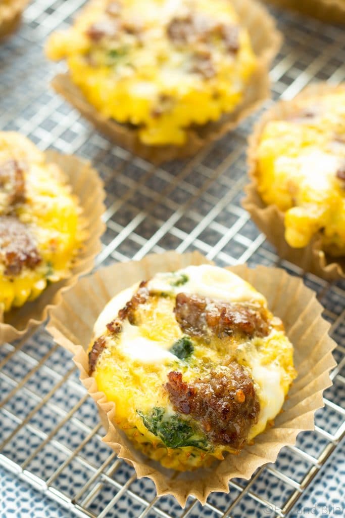 These sausage and kale egg make ahead egg muffins are a low carb, grain free, high protein breakfast that you can make ahead and store in the fridge., On busy mornings, just heat them up and have a quick healthy breakfast.