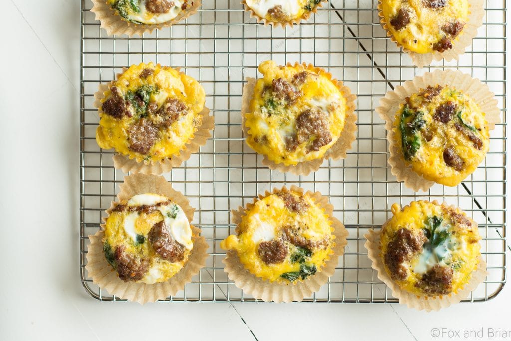 These sausage and kale egg make ahead egg muffins are a low carb, grain free, high protein breakfast that you can make ahead and store in the fridge., On busy mornings, just heat them up and have a quick healthy breakfast.