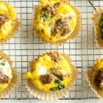 These sausage and egg make ahead muffins are a low carb, grain free, high protein breakfast that you can make ahead and store in the fridge., On busy mornings, just heat them up and have a quick healthy breakfast.