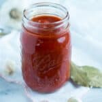 This super quick and easy classic marinara sauce takes twenty minutes to make, and uses pantry staples that you probably have on hand now. great for a weeknight meal with pasta, pizza or spaghetti squash!