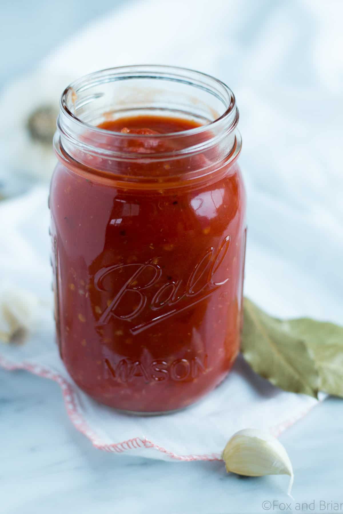 This super quick and easy classic marinara sauce takes twenty minutes to make, and uses pantry staples that you probably have on hand now. great for a weeknight meal with pasta, pizza or spaghetti squash!