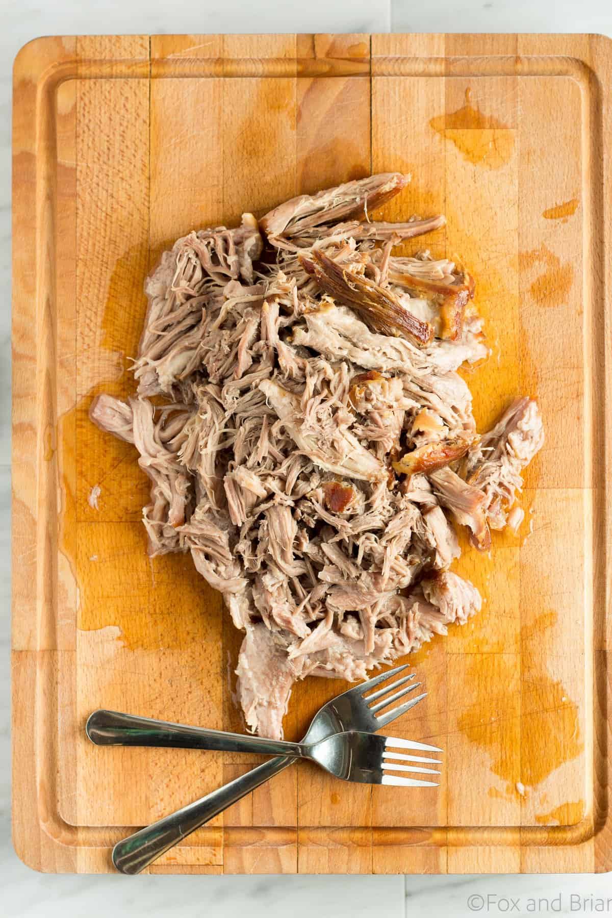 This is the easiest slow cooker pulled pork, but it tastes unbelievable! Make a huge batch and freeze some of it to put on sandwiches or pizza, in soup, tacos, fried rice and more!