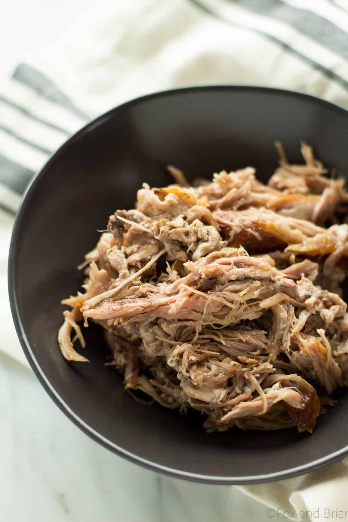 This is the easiest slow cooker pulled pork, but it tastes unbelievable! Make a huge batch and freeze some of it to put on sandwiches or pizza, in soup, tacos, fried rice and more!