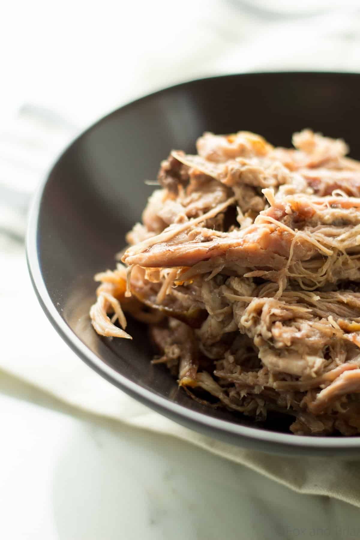 This is the easiest slow cooker pulled pork, but it tastes unbelievable! Make a huge batch and freeze some of it to put on sandwiches or pizza, in soup, tacos, fried rice and more!