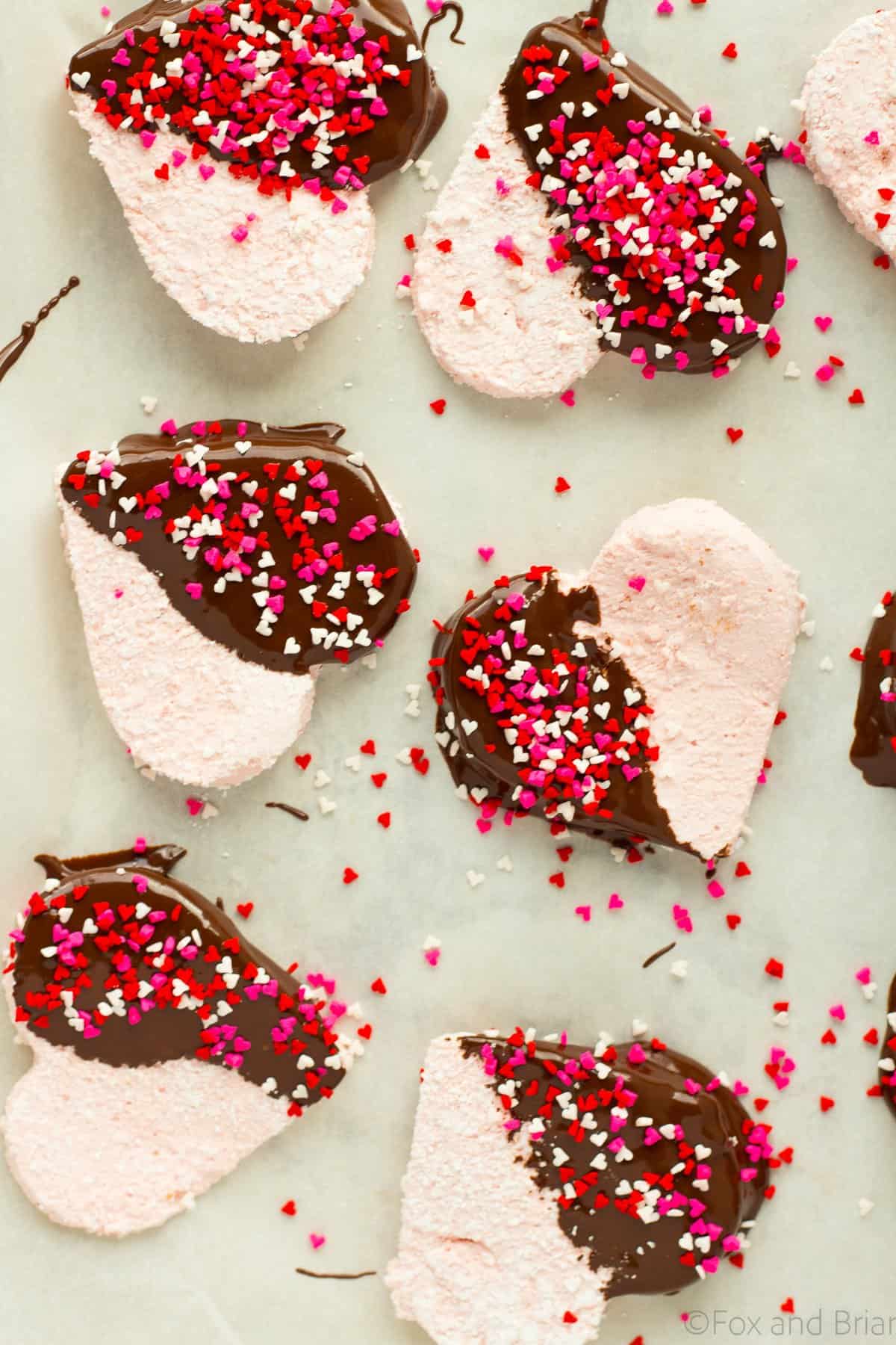 These Homemade Strawberry Marshmallows are fun and simple to make, and have amazing strawberry flavor. No high fructose corn syrup or dyes! A fun treat for Valentine's day or any other time of year!.