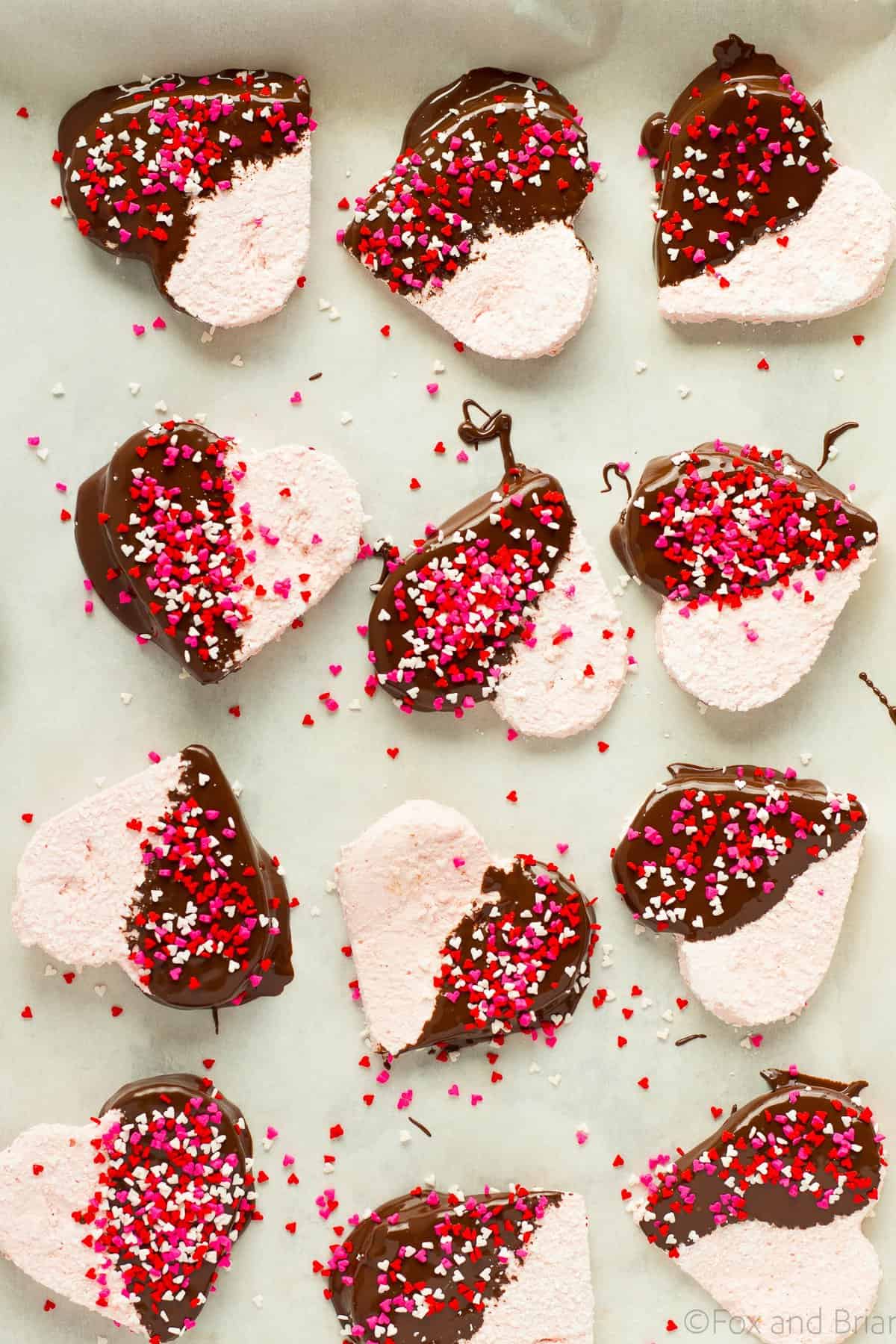 These Homemade Strawberry Marshmallows are fun and simple to make, and have amazing strawberry flavor. No high fructose corn syrup or dyes! A fun treat for Valentine's day or any other time of year!.