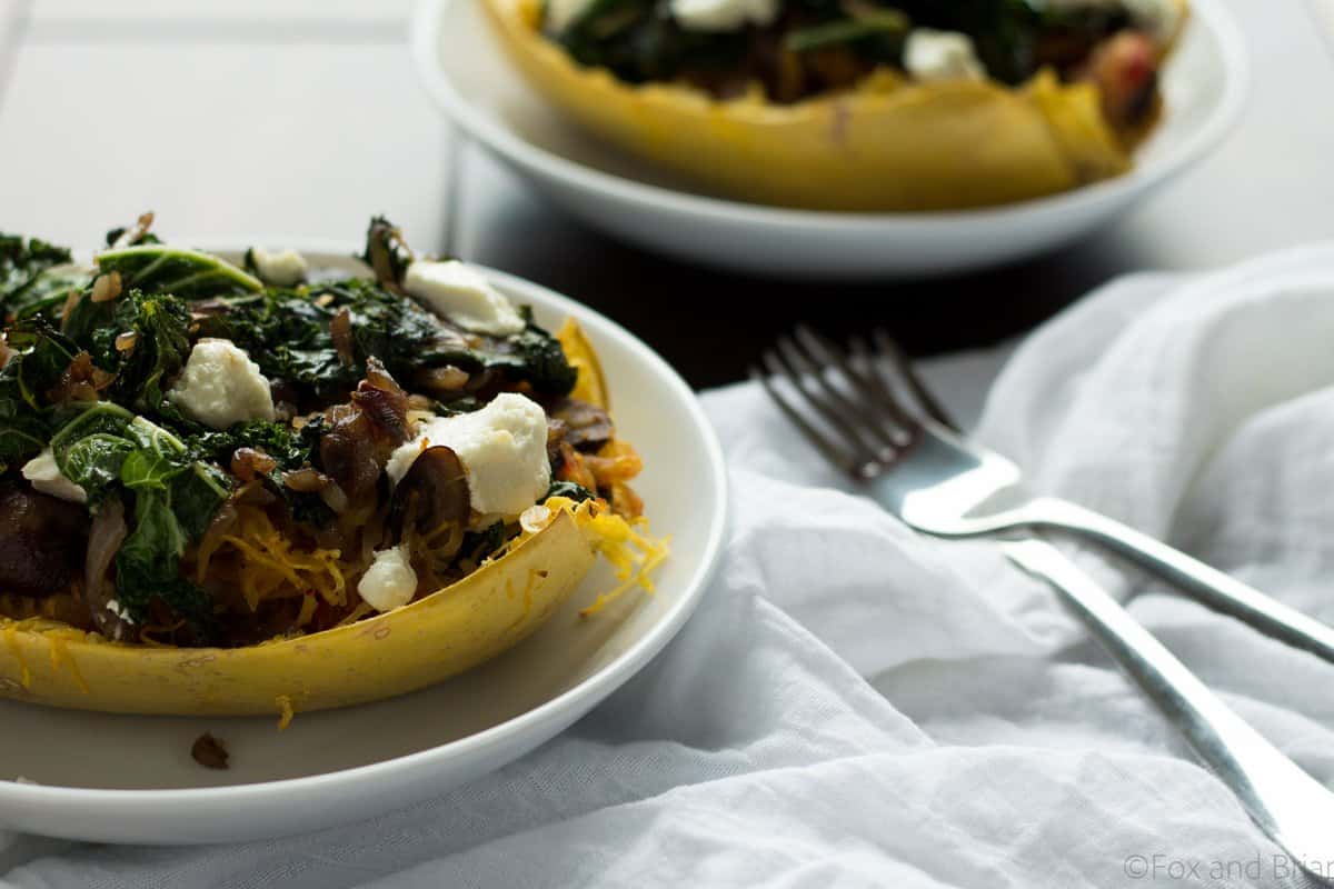 These veggie spaghetti squash boats are vegetarian, with kale, mushrooms and goat cheese. So packed with flavor and super healthy!