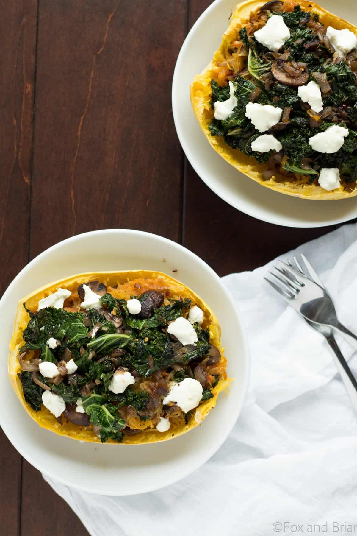 These veggie spaghetti squash boats are vegetarian, with kale, mushrooms and goat cheese. So packed with flavor and super healthy!