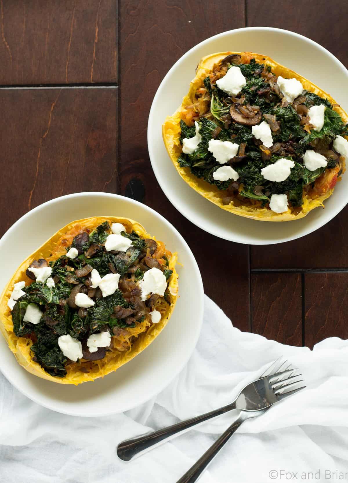 These veggie spaghetti squash boats are vegetarian, with kale, mushrooms and goat cheese. So packed with flavor and super healthy!