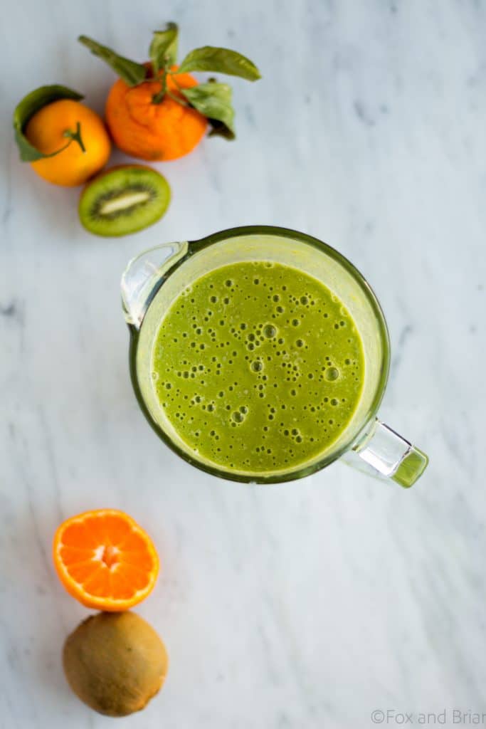 This Kiwi Satsuma Green Smoothie is the perfect winter smootie! Using the bright, tropical flavors of kiwis and satsuma, it will brighten up any dark winter morning.