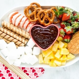 This easy chocolate fondue is a fun dessert for a romantic valentine's day dinner or party. It is rich and chocolaty and doesn't even require a fondue pot!