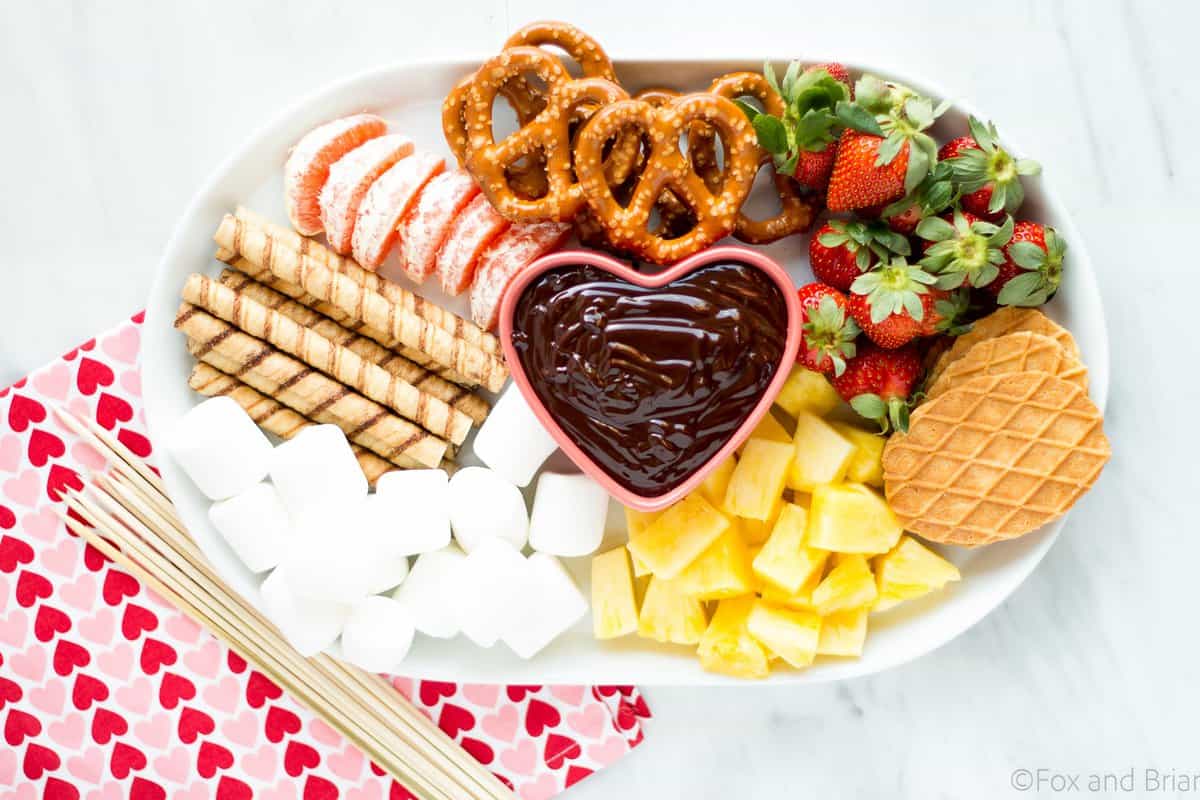 This easy chocolate fondue is a fun dessert for a romantic valentine's day dinner or party. It is rich and chocolatey and doesn't even require a fondue pot!