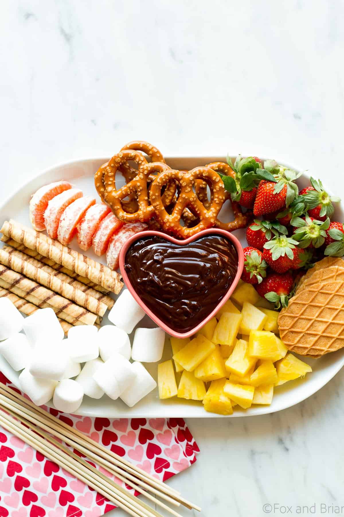 This easy chocolate fondue is a fun dessert for a romantic valentine's day dinner or party. It is rich and chocolaty and doesn't even require a fondue pot!