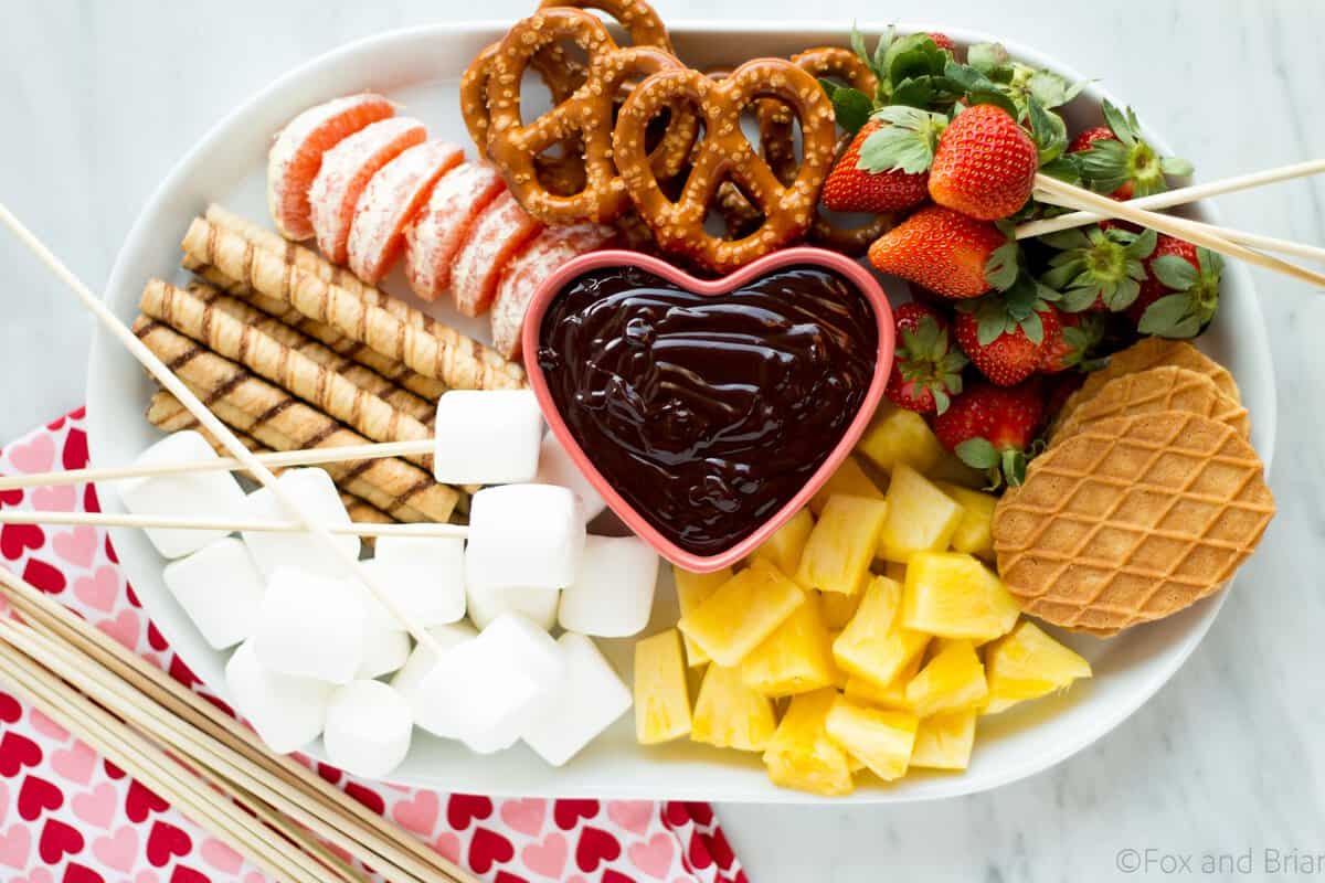 This easy chocolate fondue is a fun dessert for a romantic valentine's day dinner or party. It is rich and chocolaty and doesn't even require a fondue pot!