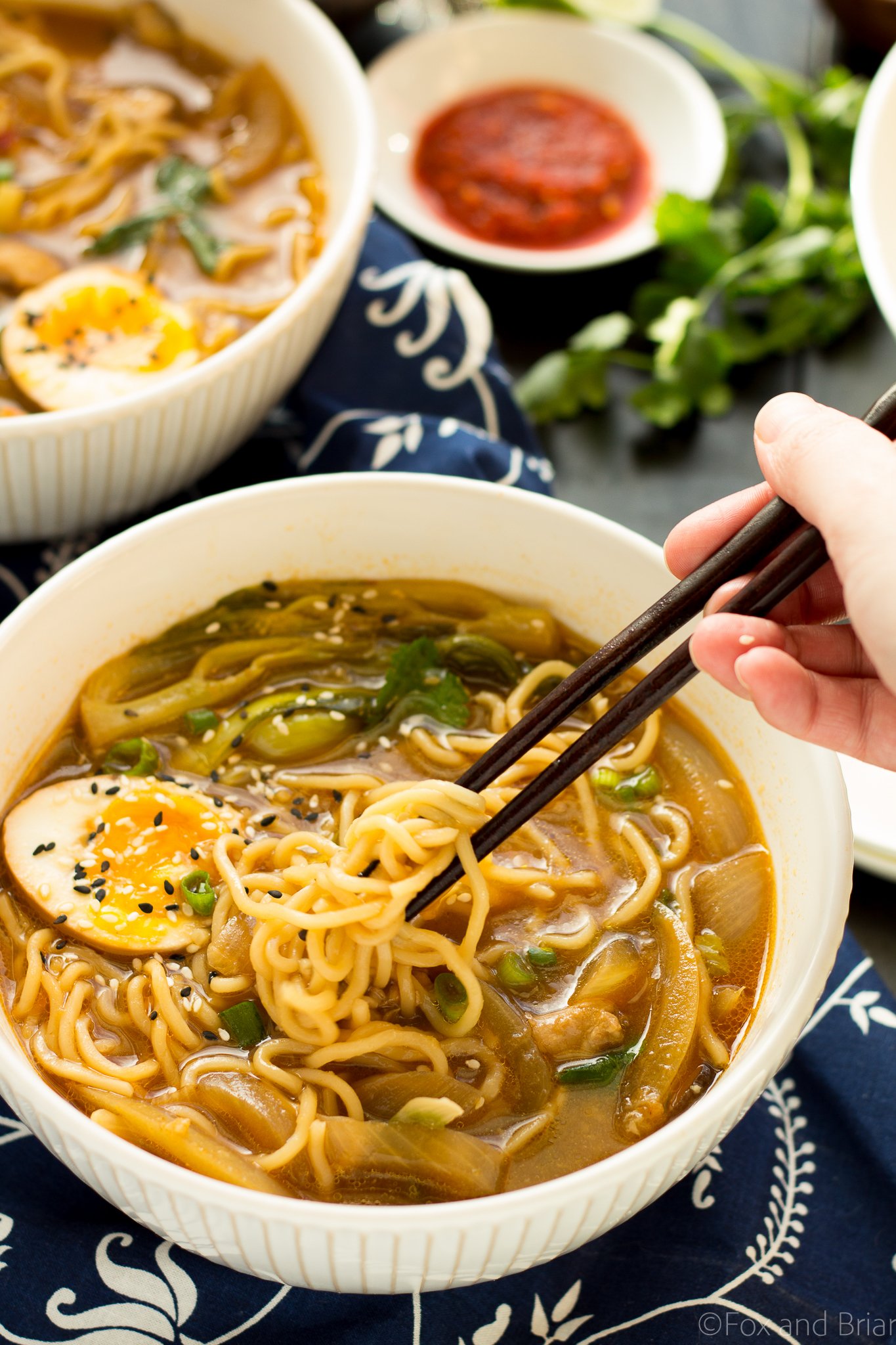 This Easy Chicken Ramen can be made at home in about 30 minutes! A flavorful broth with chicken and noodles, and don't forget the ramen egg!