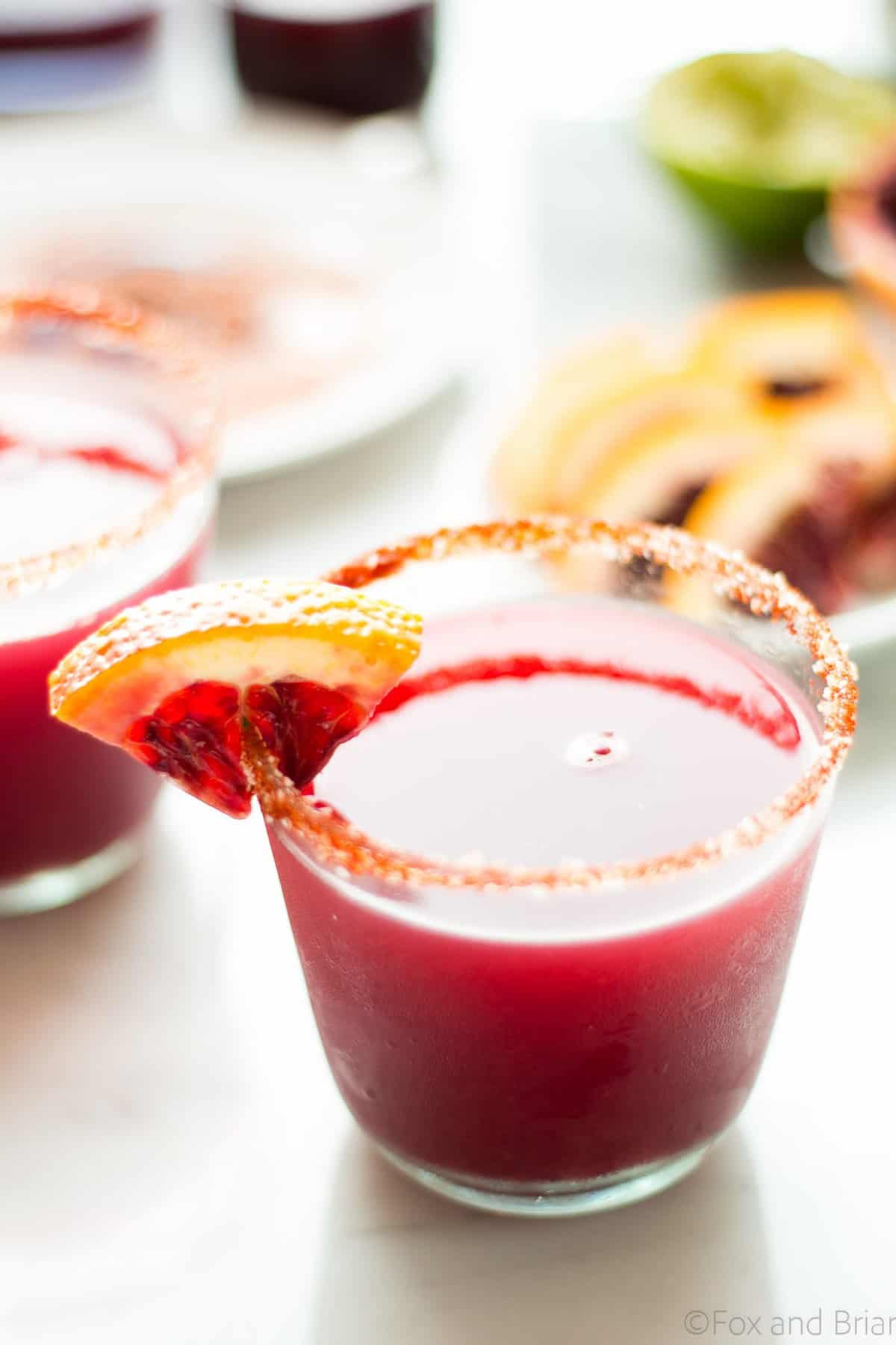 This Fresh Blood Orange Margarita has an optional smoky salted rim. The fresh citrus flavors of the blood orange make this a sweet and tart cocktail, and the smoked paprika salted rim gives it a little something extra.