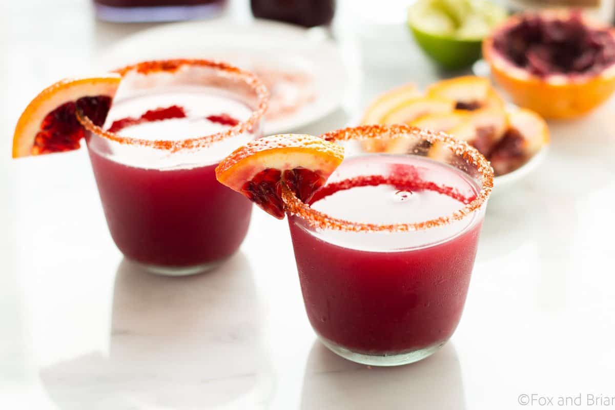 This Fresh Blood Orange Margarita has an optional smoky salted rim. The fresh citrus flavors of the blood orange make this a sweet and tart cocktail, and the smoked paprika salted rim gives it a little something extra.