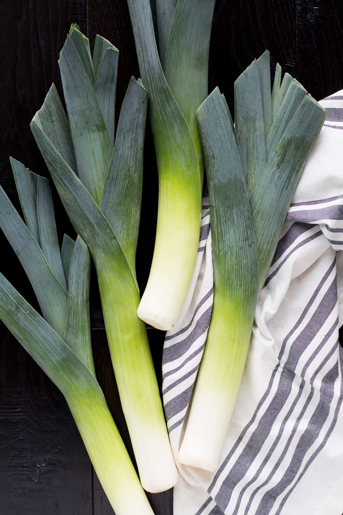 These Braised Leeks make the perfect spring side dish. They have a sweeter, more mild flavor than onions, and are caramelized before being cooked in a butter, white wine and lemon sauce. You and your guests won't be able to stop eating them!