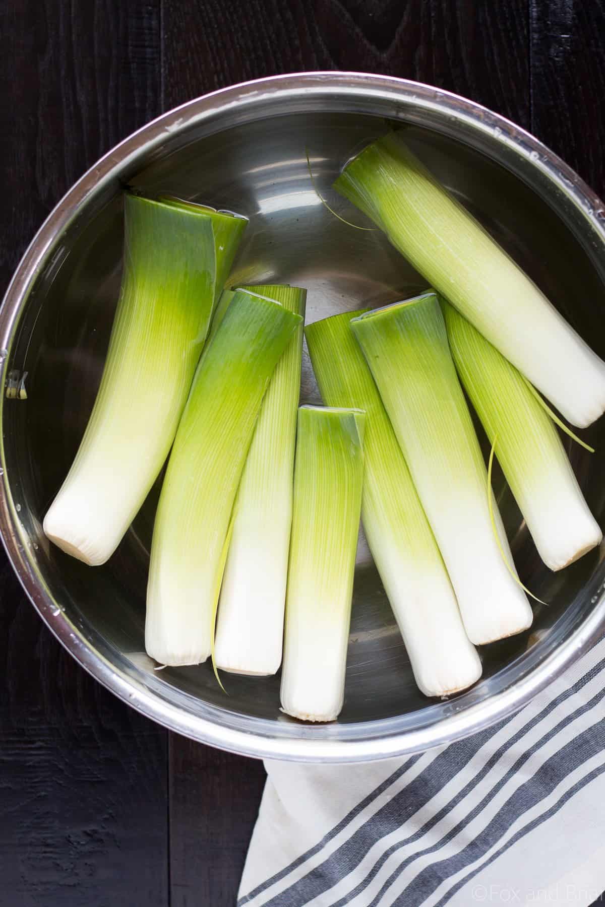 These Braised Leeks make the perfect spring side dish. They have a sweeter, more mild flavor than onions, and are caramelized before being cooked in a butter, white wine and lemon sauce. You and your guests won't be able to stop eating them!