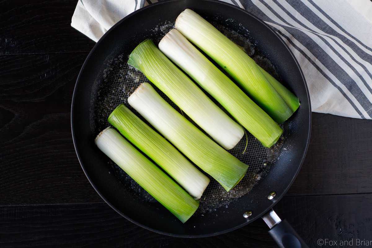 These Braised Leeks make the perfect spring side dish. They have a sweeter, more mild flavor than onions, and are caramelized before being cooked in a butter, white wine and lemon sauce. You and your guests won't be able to stop eating them!