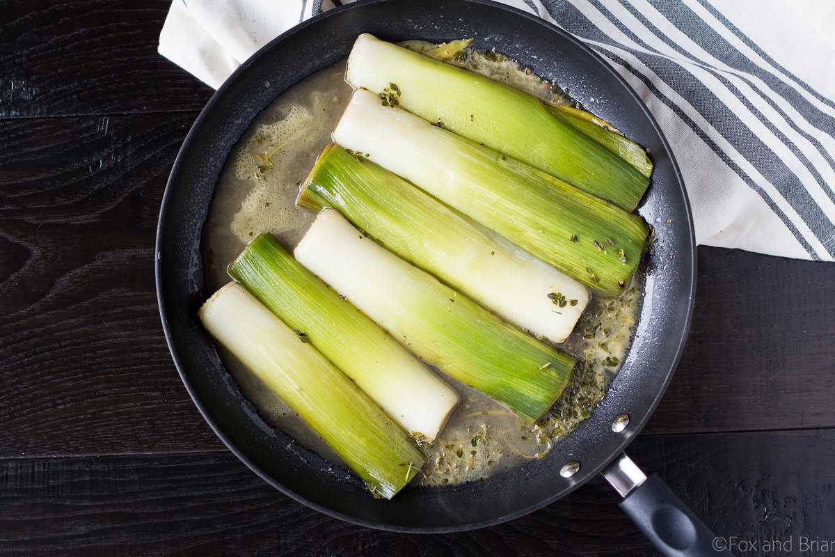 These Braised Leeks make the perfect spring side dish. They have a sweeter, more mild flavor than onions, and are caramelized before being cooked in a butter, white wine and lemon sauce. You and your guests won't be able to stop eating them!