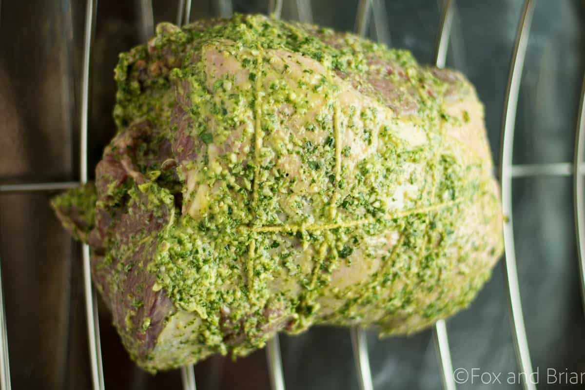 This delicious Fresh Herb boneless Leg of Lamb is smothered in a mixture of fresh herbs and garlic and then roasted to perfection. Perfect for a spring celebration dinner!