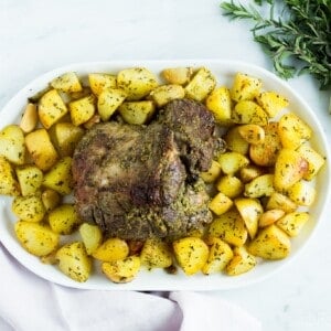 This delicious Fresh Herb boneless Leg of Lamb is smothered in a mixture of fresh herbs and garlic and then roasted to perfection. Perfect for a spring celebration dinner!