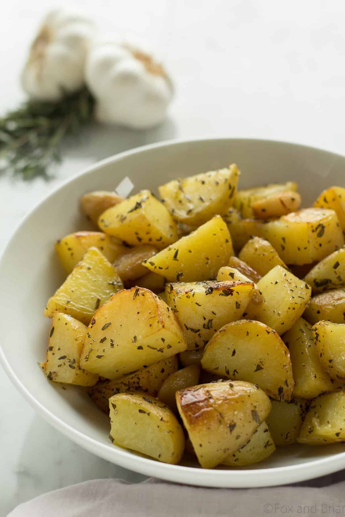 Crispy Roasted Garlic and Rosemary Potatoes. Golden potatoes roasted with garlic and rosemary are your perfect side dish.