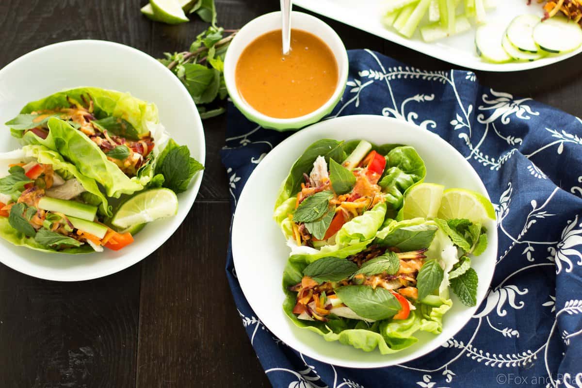 These Ginger peanut lettuce wraps are filled with colorful veggies, your protein of choice, and the most addictive peanut sauce ever!