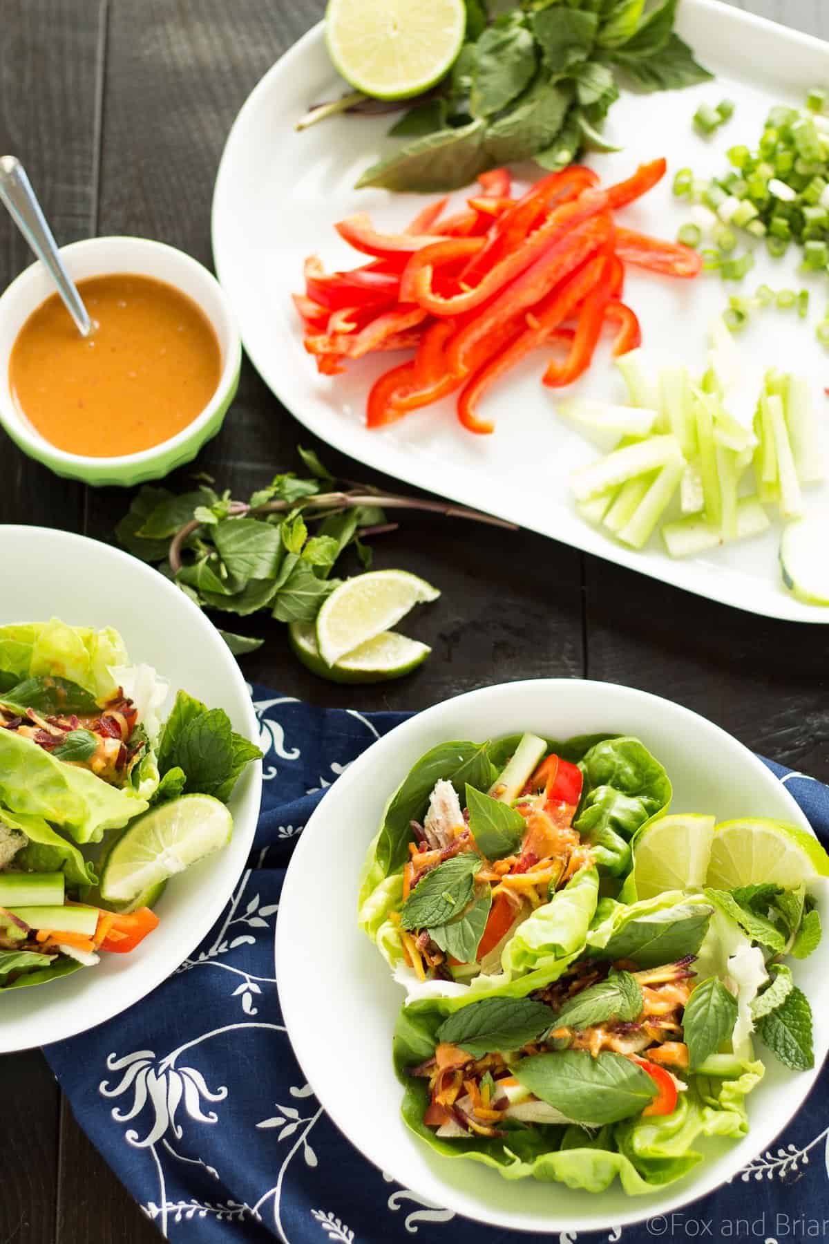 These Ginger peanut lettuce wraps are filled with colorful veggies, your protein of choice, and the most addictive peanut sauce ever!