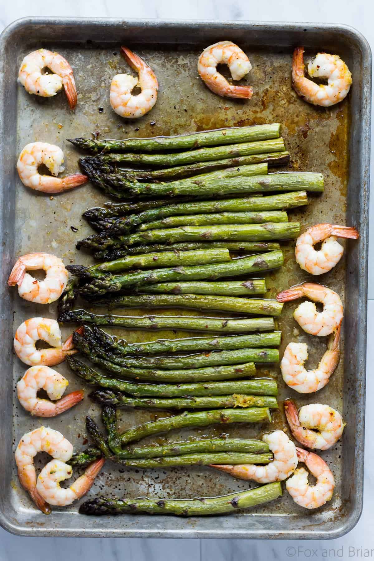 This Roasted Shrimp and Asparagus is a quick one sheet meal can be made in about 20 minutes and is tasty and healthy!