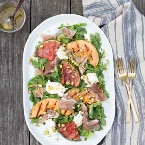 This Grilled Melon Salad with Prosciutto and Burrata is a light dinner perfect for a hot summer day!