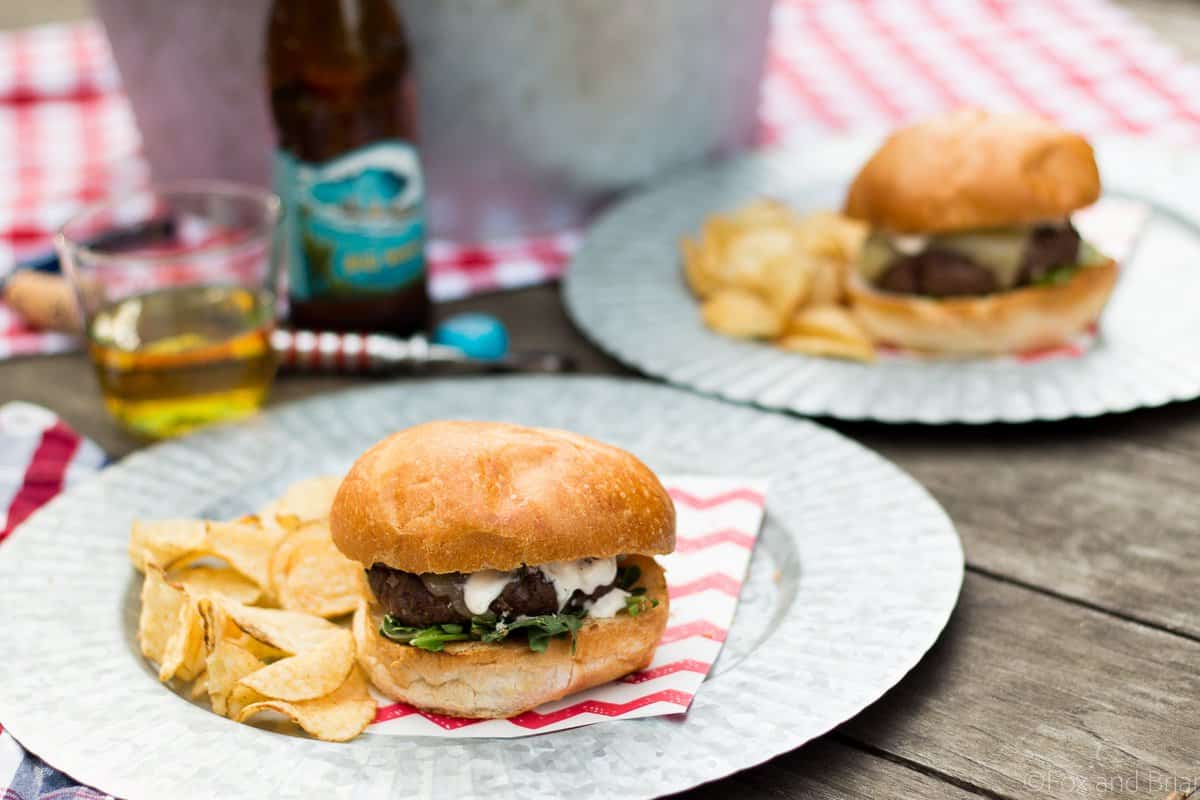 These Shallot White Cheddar Burgers use shallots to flavor the burger, and are topped with white cheddar and a garlic aioli for a flavor bomb gourmet burger!