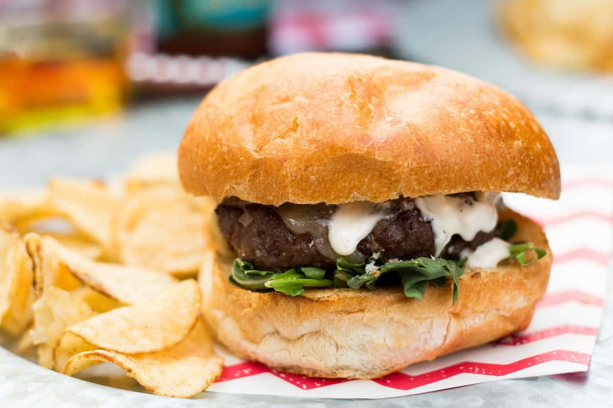 These Shallot White Cheddar Burgers use shallots to flavor the burger, and are topped with white cheddar and a garlic aioli for a flavor bomb gourmet burger!